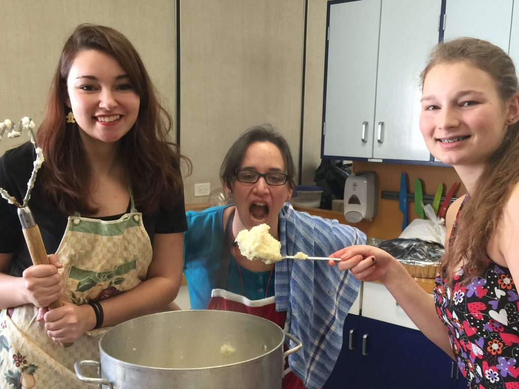 CSS foods class making mashed potatoes to serve at the CSS PAC Christmas turkey lunch.